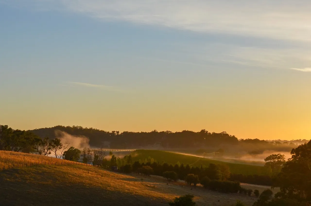 Misty sunrise over the Adelaide Hills at The House On Soul Hill